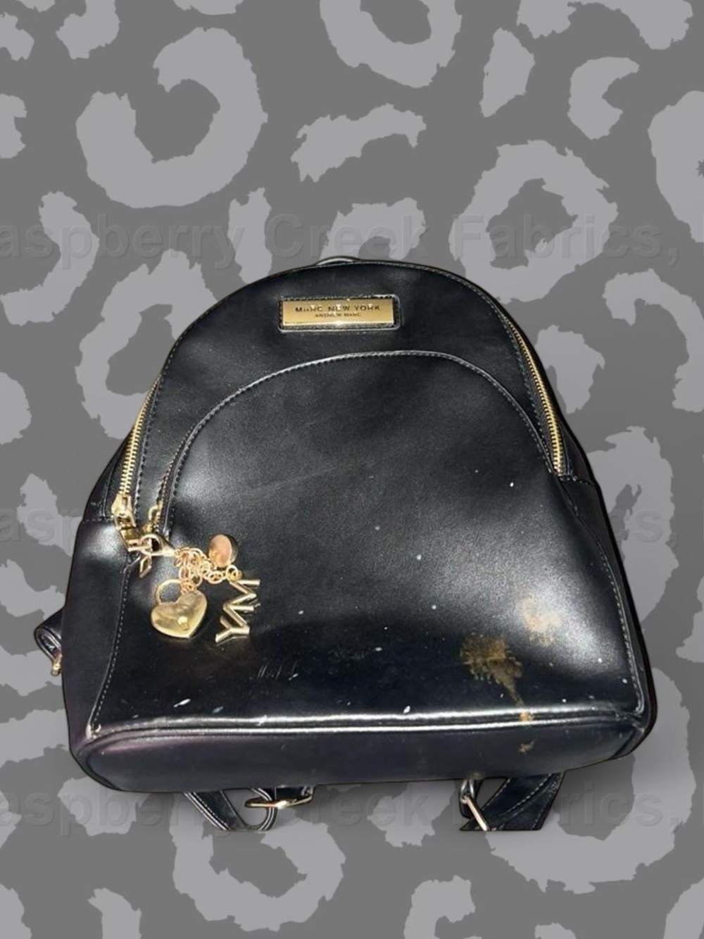 Andrew Marc Black Mini Leather Backpack with Gold Charms